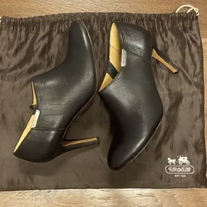 Coach black heeled booties.